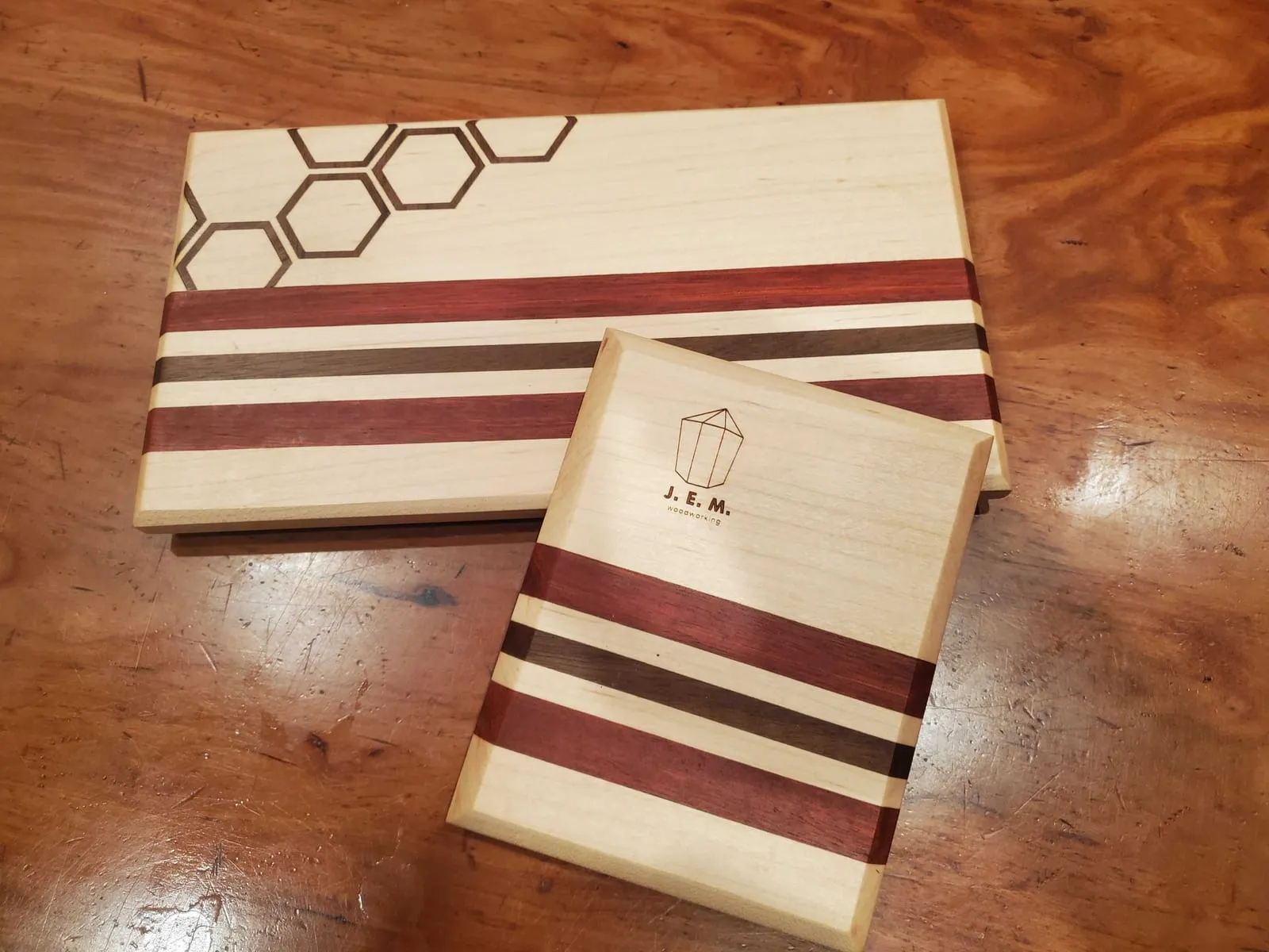 Pair of cheese boards with honeycomb inlay, walnut and maple