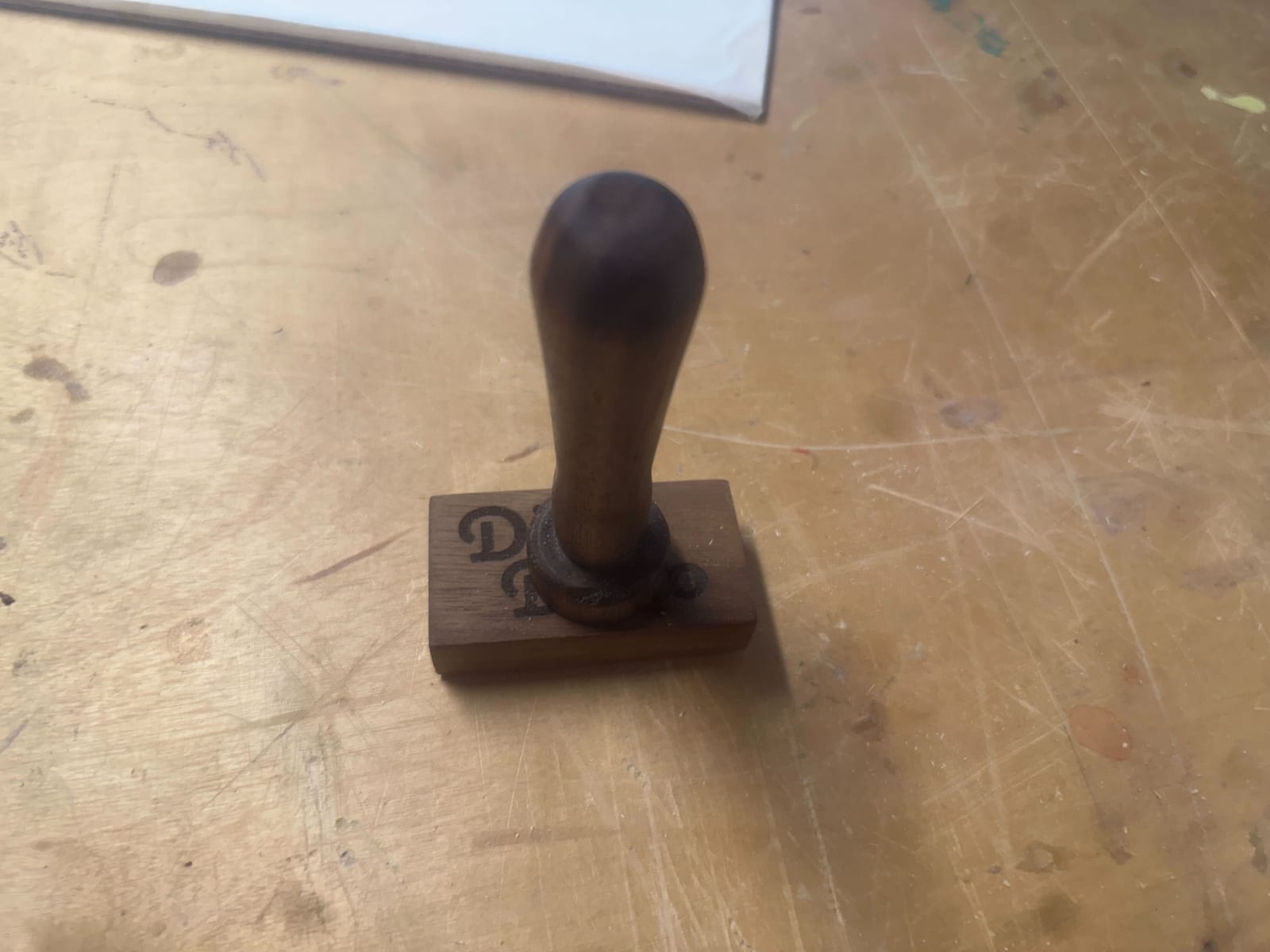 Assembled branding stamp with turned walnut handle