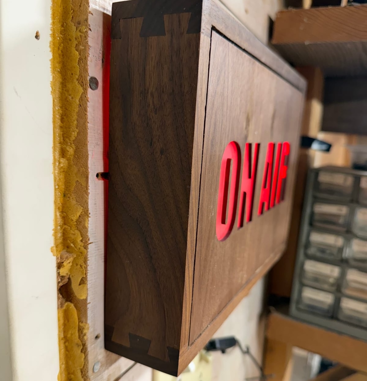 Detail of the "On Air" sign showing dovetailed corners