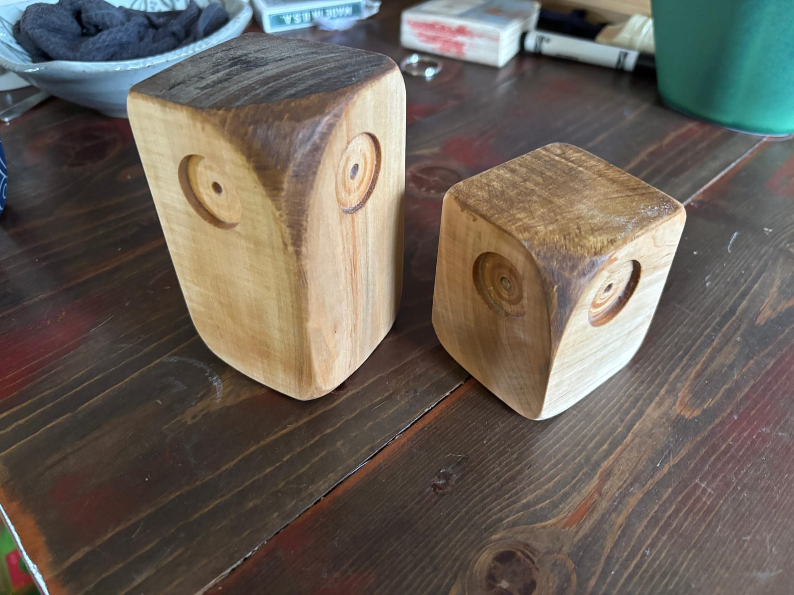 Carved owl figures
